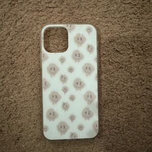 Melty smiley face iPhone 12 cover